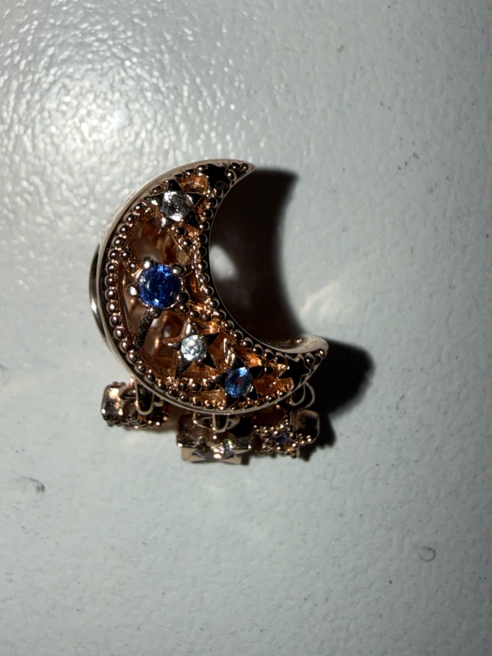 Pandora Rose Gold Crescent Moon Charm with Blue and Clear Stones